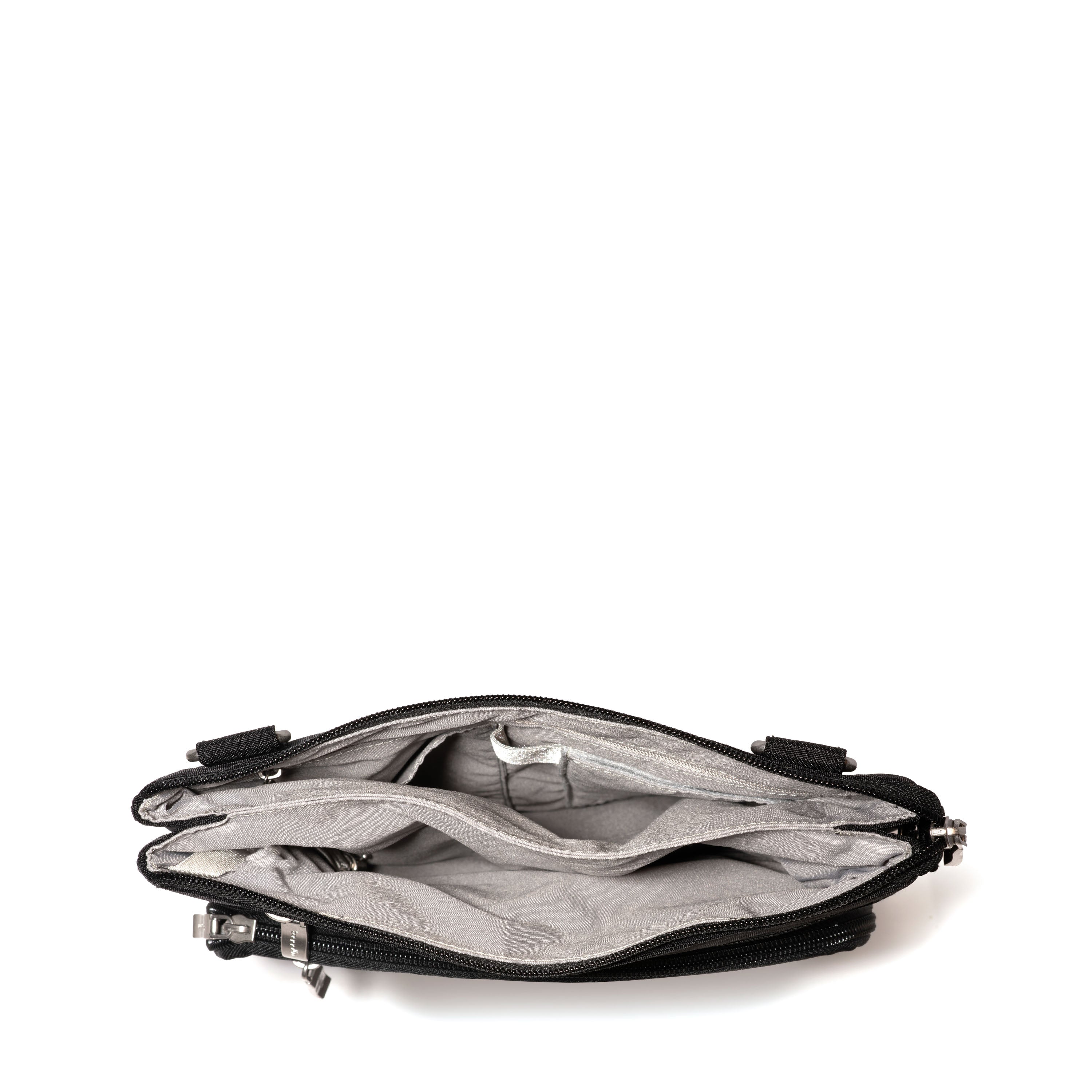 Out and About Crossbody Grab with front zipper pocket that includes RFID-protected credit card slots - interior view.